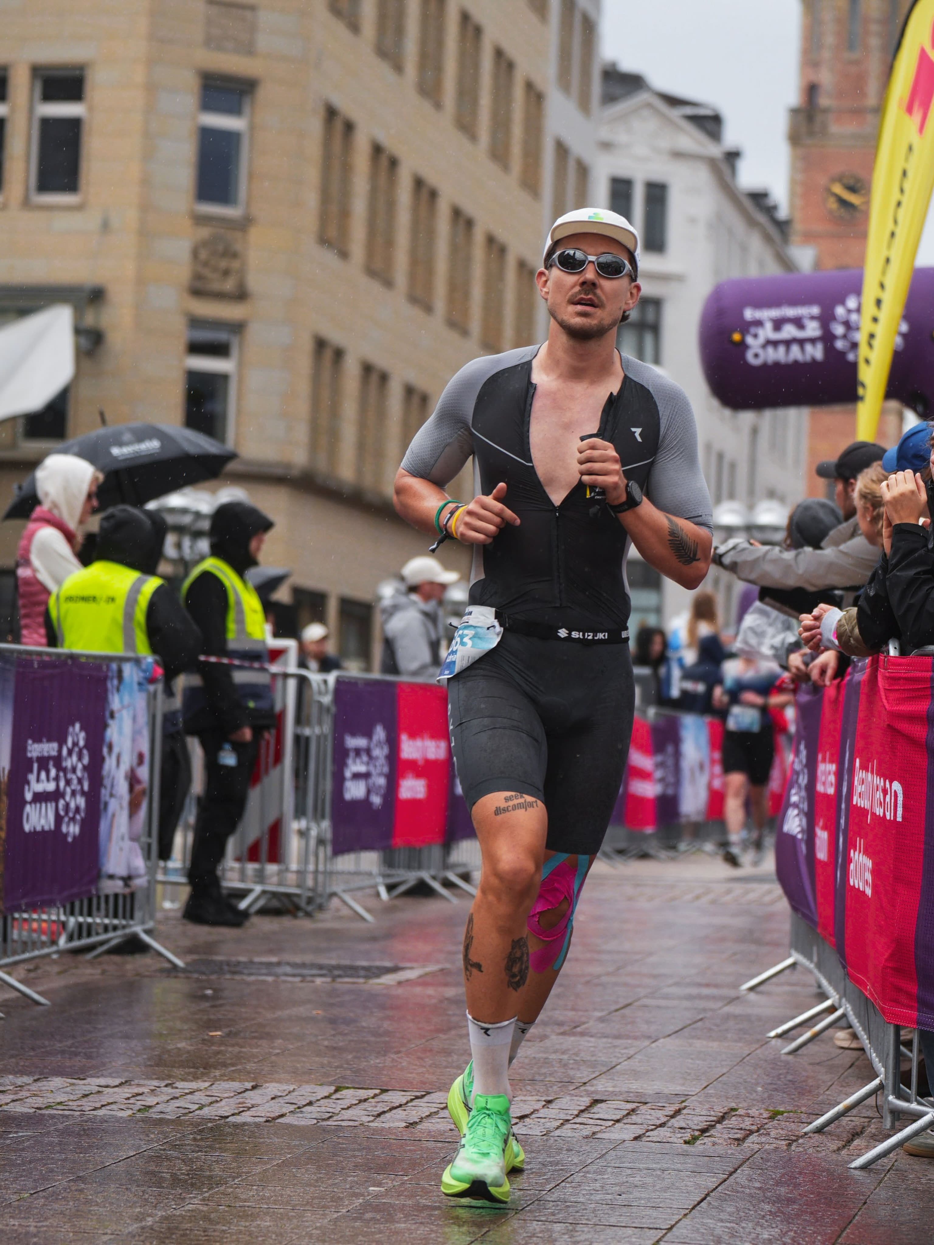Adrian running in the rain.
